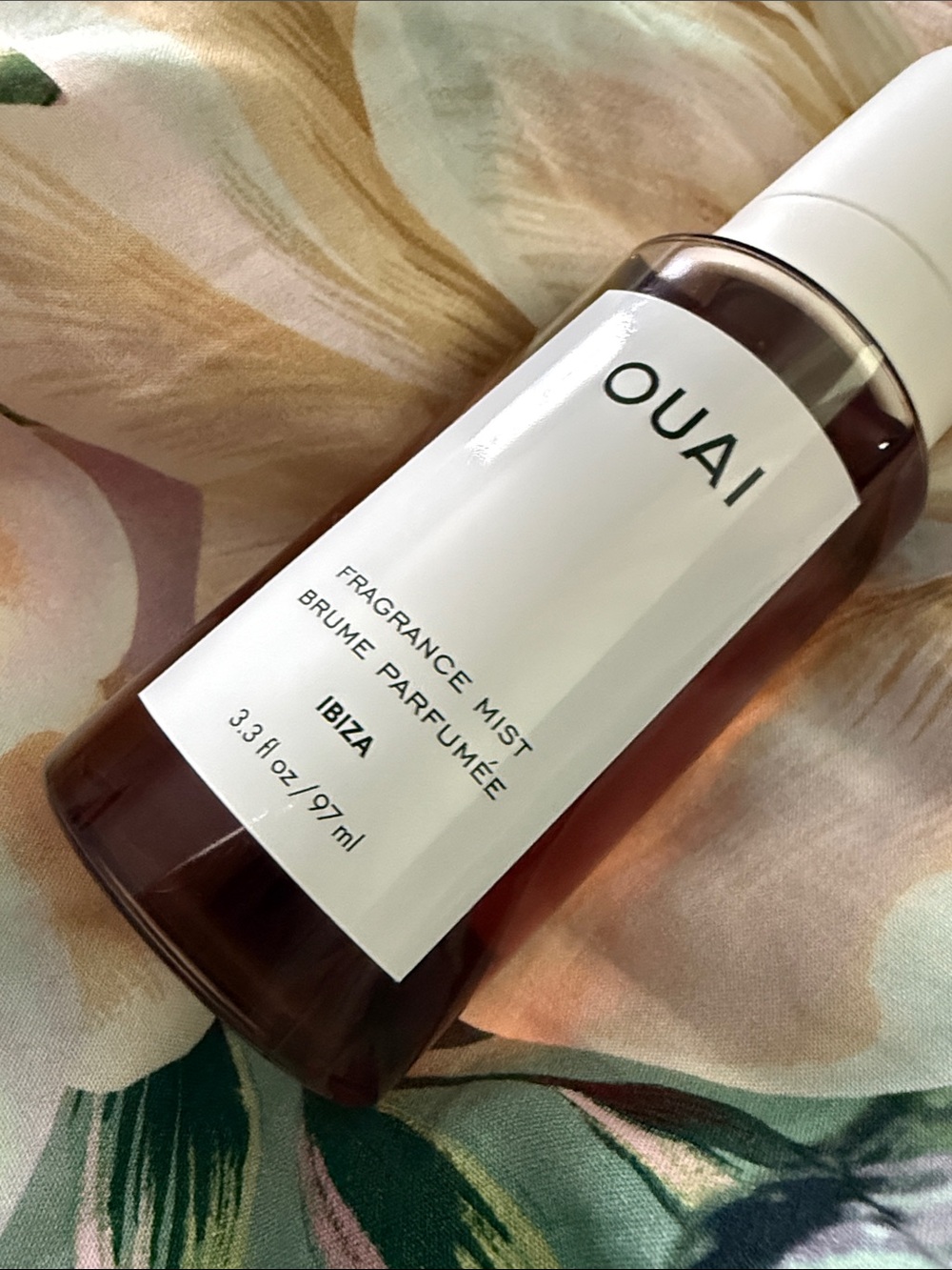 Large bottle OUAI Ibiza Fragrance Mist — Amber-Pink Bottle with White Label